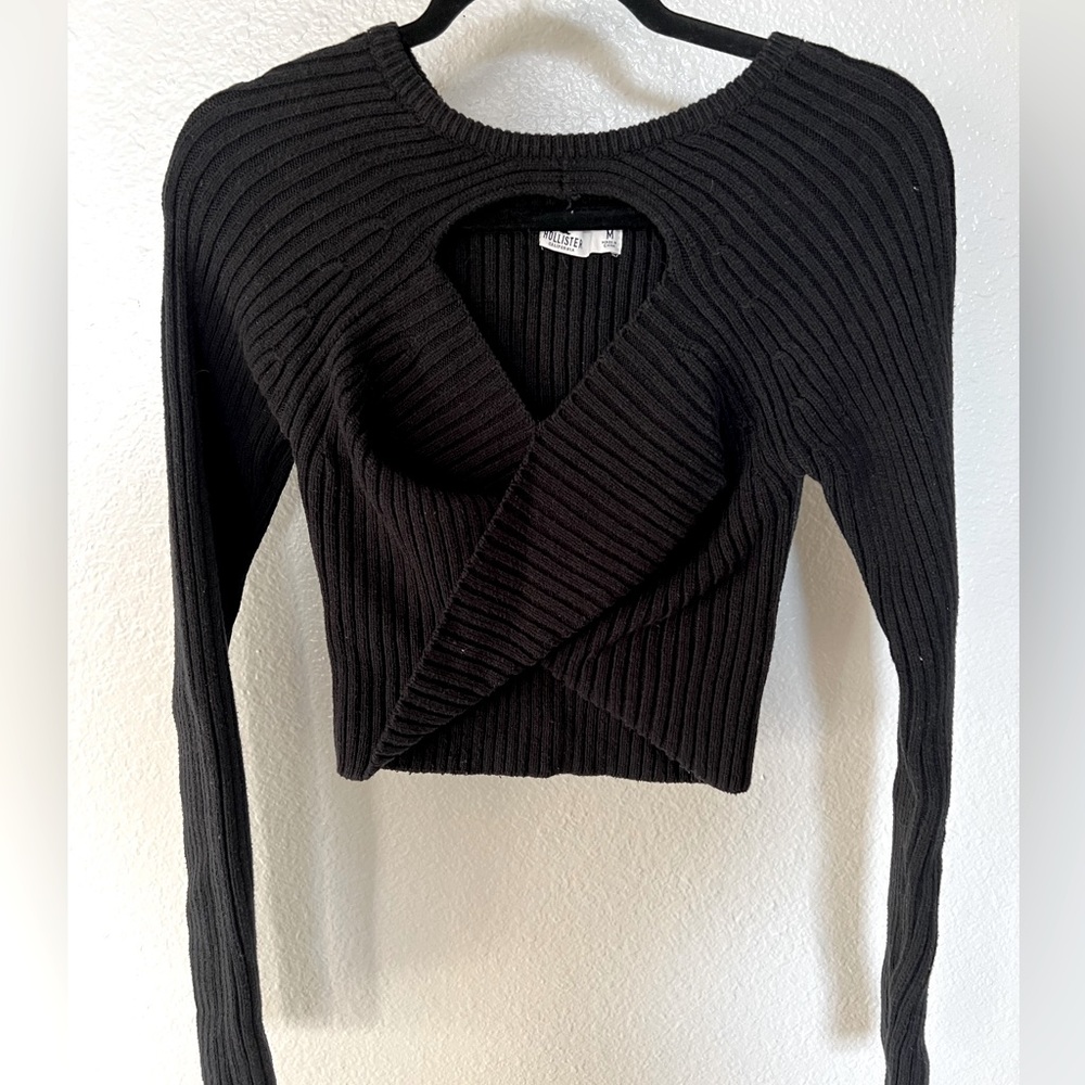 Black sweater front twist